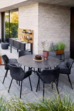 Cane-line Circle fotpall, liten, konformad, mörkgrå