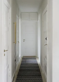 NUAD Radent vägglampa 70 cm, mässing