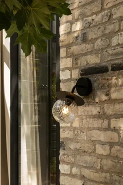 Nuura Liila Outdoor vägglampa, svart - optic clear